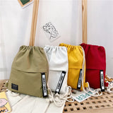 Casual Canvas Drawstring Backpack with Letter Pattern Closure