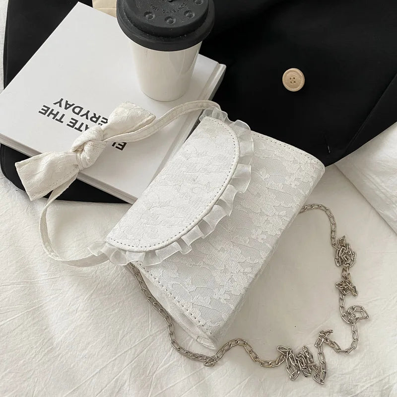 Embossed Lace Up Bow Handle Women Shoulder Bag