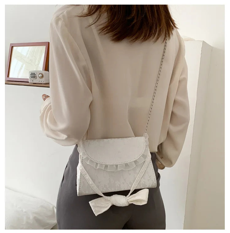 Embossed Lace Up Bow Handle Women Shoulder Bag