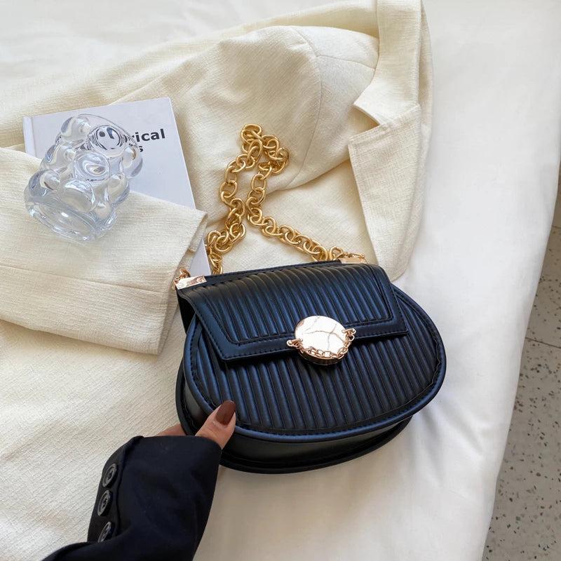 Trendy Women's Stripe PU Leather Handbag with Solid Chain Saddle Shoulder Bag