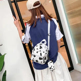 D0UD Mini Canvas Daypack with Plush Pendant Cow Print Backpack for Women