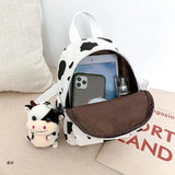 D0UD Mini Canvas Daypack with Plush Pendant Cow Print Backpack for Women