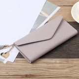 Tassel Heart Pendant Clutch Bag Multi-Functional Lychee Pattern