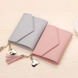 Tassel Heart Pendant Clutch Bag Multi-Functional Lychee Pattern