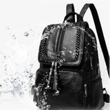 Vintage Leather Anti-Theft Backpack with Tassel Accent