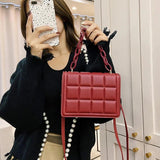 Embossed Leather Flap Crossbody Bag