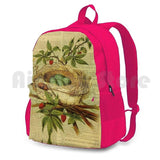 Vintage Bird Nest Sports Backpack on Old Book