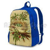 Vintage Bird Nest Sports Backpack on Old Book