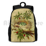 Vintage Bird Nest Sports Backpack on Old Book
