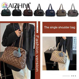 Quilted Shoulder Bag with Pompom Pendant