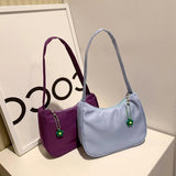 Solid Nylon Underarm Bag with Flower Pendant