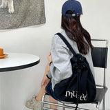 Embroidered Canvas Drawstring School Backpack for Women