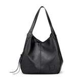 Women's Leather Crossbody Bag with Tassel Detail