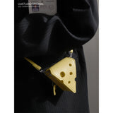 COY UUSTUDIO Mini Hole Cheese Triangle Lipstick Headsets Cross Body Bag