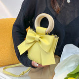 DIY Material Wrapped Hand-Sewn Bow Bucket Bag
