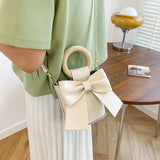 DIY Material Wrapped Hand-Sewn Bow Bucket Bag