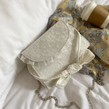 Embossed Lace Up Bow Handle Women Shoulder Bag