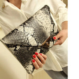 Famous Serpentine Pattern PU Leather Clutches Bag