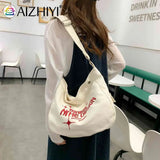 Embroidered Letters Canvas Messenger Bag Large Capacity
