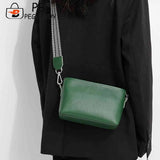 Crossbody Bag with Wide Fabric Strap in Cowhide Leather