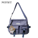 Women's Crossbody Bag with Pockets and Pendant - Zipper Closure
