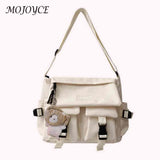 Women's Crossbody Bag with Pockets and Pendant - Zipper Closure
