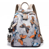 Women's Waterproof Feather Print Backpack Large Capacity Schoolbag