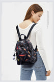 Women's Waterproof Feather Print Backpack Large Capacity Schoolbag
