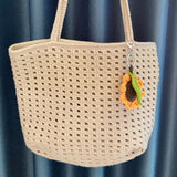 Hand Crocheted Hollow out satchel with Pendant