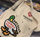 Khaki Canvas Duck Backpacks Cartoon Graphic Snap Button Human Heart Bag