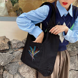 Feather Print Canvas Crossbody Tote Bag
