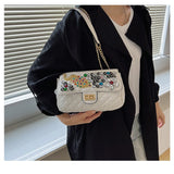 Solid Diamond Inlaid Leather Crossbody Bag with Peacock Chain