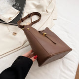 Women's Large Leather Shoulder Bag with High Hardware Pendant