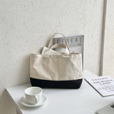 Large-Capacity Canvas Shoulder Bag with Creative Stitching