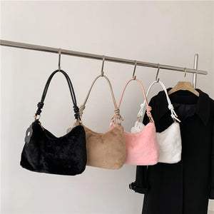 Soft Solid Ladies Handbag with Flower Pendant