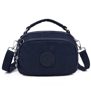 Qiaoduo Small Canvas Shoulder Bag Multi-compartment Portable Mom Phone Bag