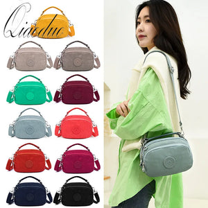 Qiaoduo Small Canvas Shoulder Bag Multi-compartment Portable Mom Phone Bag