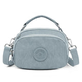Qiaoduo Small Canvas Shoulder Bag Multi-compartment Portable Mom Phone Bag