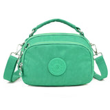 Qiaoduo Small Canvas Shoulder Bag Multi-compartment Portable Mom Phone Bag