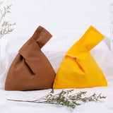 Japanese Style Knot Wrist Bag Solid Hand Bags Lady Purse