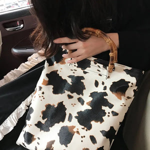 Women Bamboo Joint Handle Cow Pattern Shoulder Bag