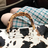 Women Bamboo Joint Handle Cow Pattern Shoulder Bag