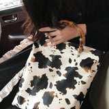 Women Bamboo Joint Handle Cow Pattern Shoulder Bag