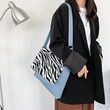 Women Denim Shoulder Bag with Leopard Print Design