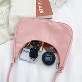 Top-handle Clutch in Beige Pink Color