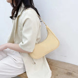 Top-handle Clutch in Beige Pink Color