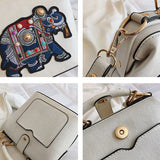 Embroidered Elephant Crossbody Bag with Wide Butterfly Strap