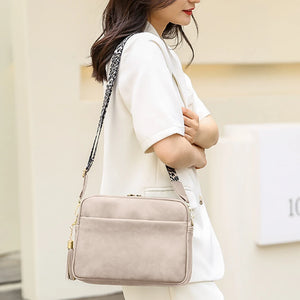 Small Square Crossbody Bag with Tassels and Wide Strap