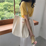 Bonjour Embroidered Canvas Shoulder Bag