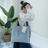 Women's Canvas Shoulder Bag Large Capacity Tote with Cartoon Pendant
